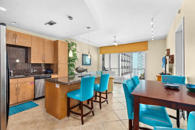 Fantastic open living, kitchen, and dining concept. Guests will love the extra seating at the kitchen bar Fantastic open living, kitchen, and dining concept. Guests will love the extra seating at the kitchen bar