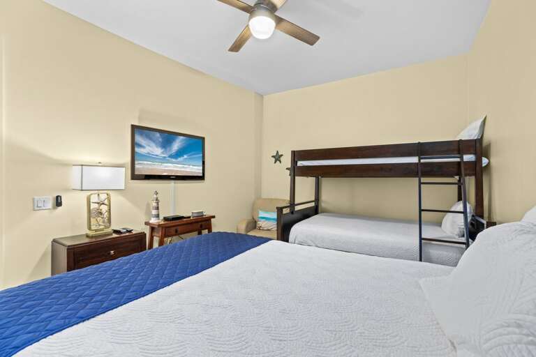 Guest Bedroom features a Queen Bed with Bunk Beds -Twin over Full and flat screen tv Guest Bedroom features a Queen Bed with Bunk Beds -Twin over Full and flat screen tv