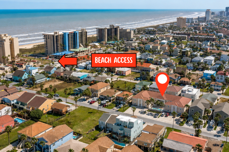 Beach access is just half a block away, making every beach day effortless.