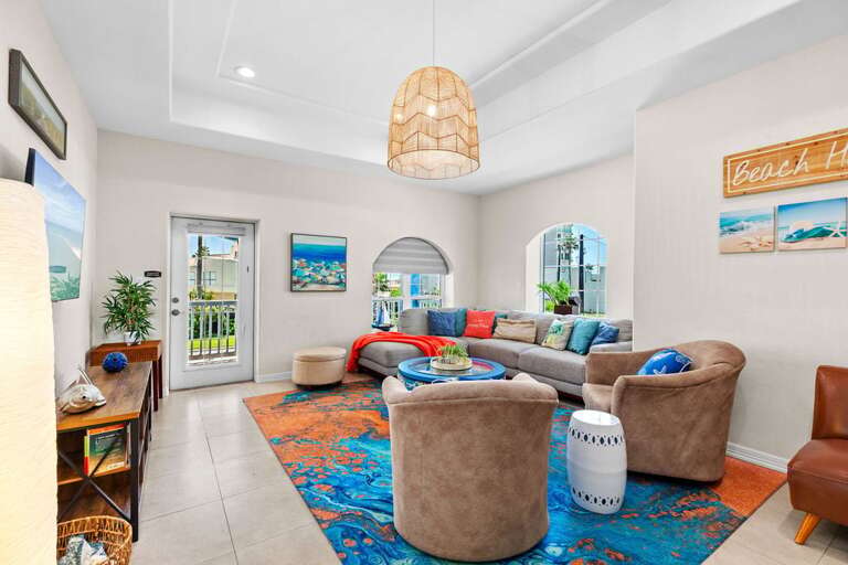 Bright Living Room With Furniture And Colorful Carpet Bright Living Room With Furniture And Colorful Carpet