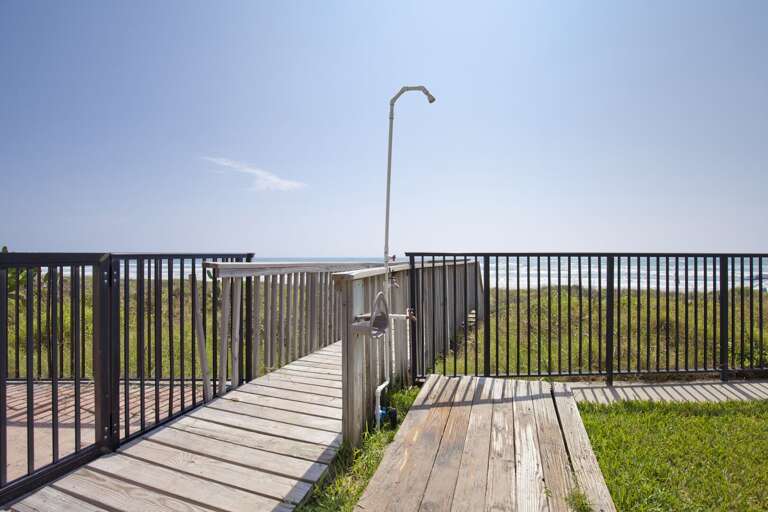 Boardwalk leading towards our beach! With shower