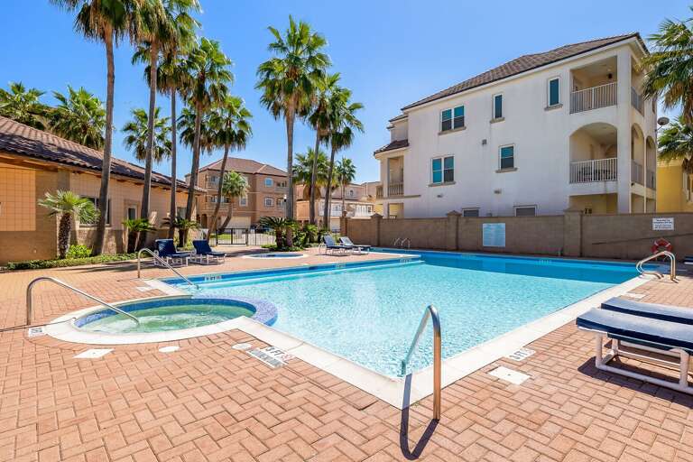 Large community pool with lounge chairs that get plenty of sun during the day!