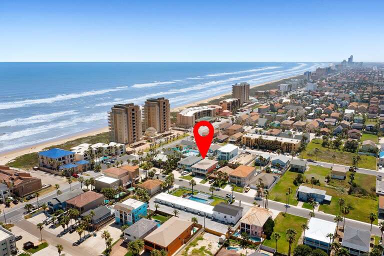 Aerial view of the property with the beautiful South Padre Island beach!