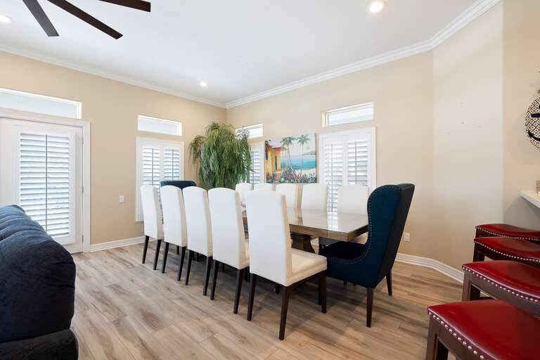 Beautiful dining room with large table (accommodates 12 guests.) Additional seating at the bar & plenty of outdoor dining space as well!