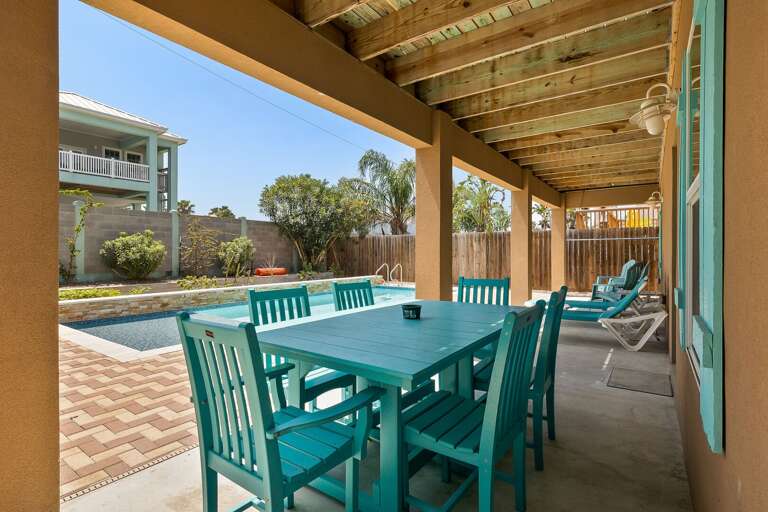 Covered patio by the private pool! Perfect for a poolside lunch, or evening dinner!