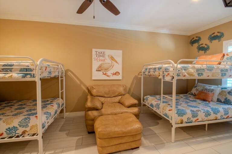 Guest Bedroom (Padre) located on the ground floor features 2 sets of full bunk beds and a flat screen TV! Sleeps 8 total! Guest Bedroom (Padre) located on the ground floor features 2 sets of full bunk beds and a flat screen TV! Sleeps 8 total!