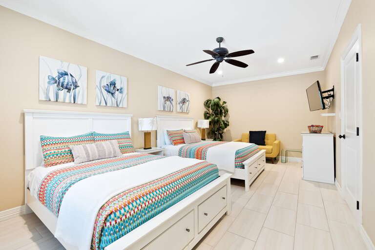 Guest Bedroom (Puerto La Cruz) located on the ground floor features 2 Queen Beds and a flat screen TV. Sleeps 4 total)