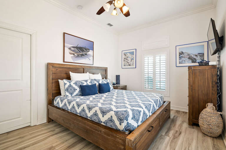 Guest Bedroom (Santorini) located on the second floor features a King Bed and is equipped with a flat screen TV as well!