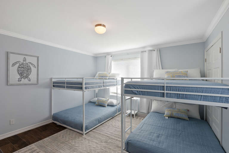 Bunkhouse (located on the 1st floor) featuring two full-size bunk beds and smart TV Bunkhouse (located on the 1st floor) featuring two full-size bunk beds and smart TV