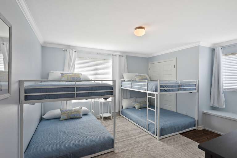 Bunkhouse (located on the 3rd floor) featuring two full-size bunk beds and smart TV Bunkhouse (located on the 3rd floor) featuring two full-size bunk beds and smart TV