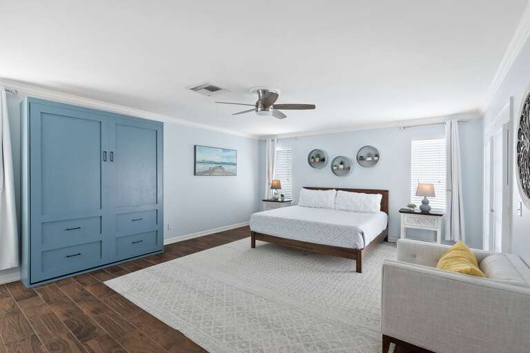Oceanside Suite: Elegant 2nd floor master bedroom featuring a comfortable KING size bed, a large