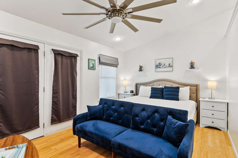 2nd Bedroom with King size bed and flat screen TV.