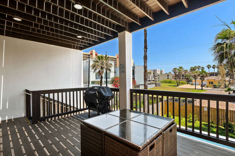 2nd floor balcony off the kitchen/dining area (facing the pool).