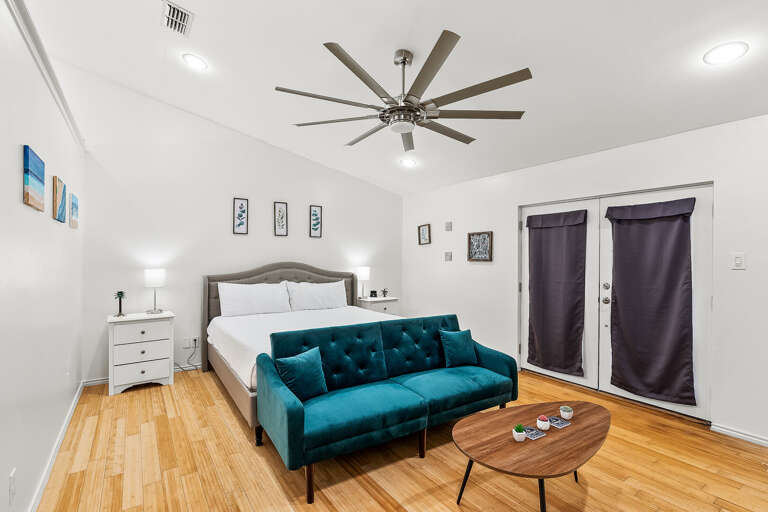 Master Bedroom with King bed and flat screen TV.