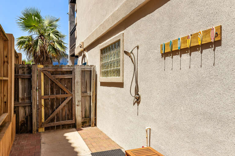Outdoor shower to rinse off the sand after a long day at the beach!