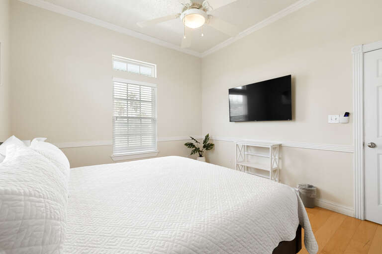 Guest bedroom features flat screen TV located on the 2nd floor.