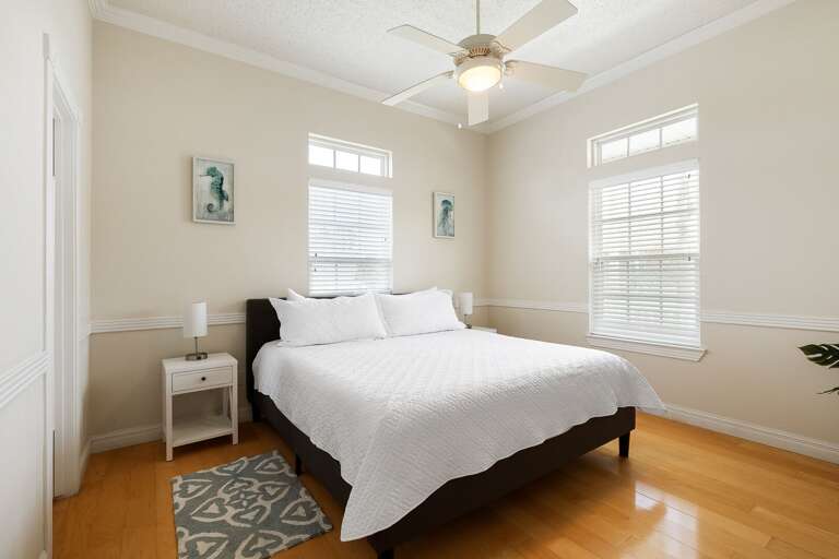 Guest bedroom located on the 2nd floor features king bed.