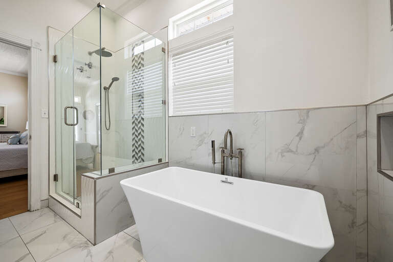 Master bathroom features walk in shower and tub!