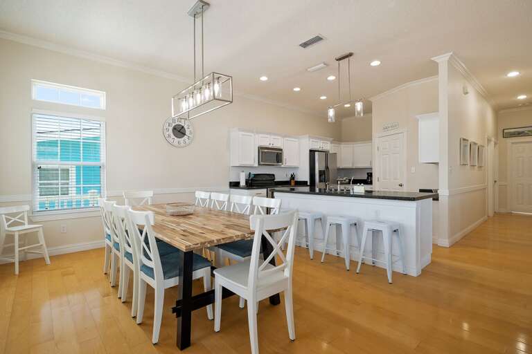 Open concept dining table connected to the Kitchen