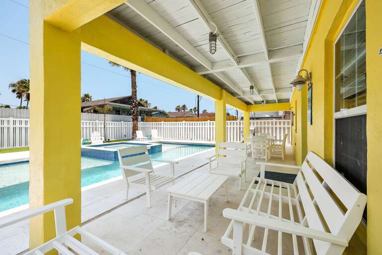 Poolside seating to enjoy the private pool with the family!