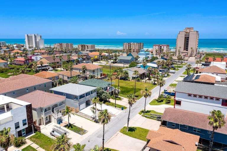 Aerial view of the property with the beach!