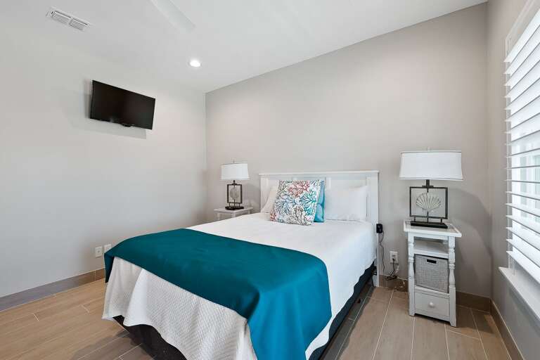 Guest bedroom features flat screen TV