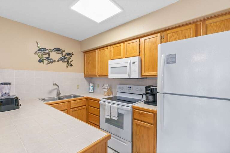 Kitchen is fully stocked to enjoy a home cooked meal!