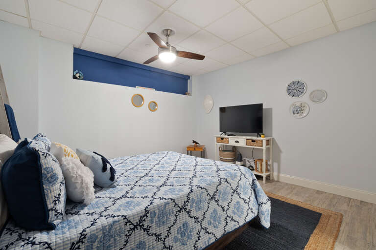 Guest Bedroom with a Flat Screen TV