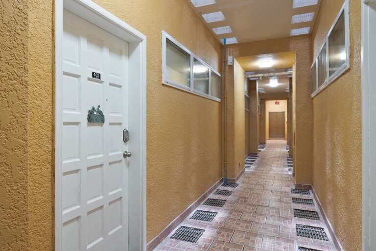 Hallway of the Complex exiting the elevators leads directly to your unit