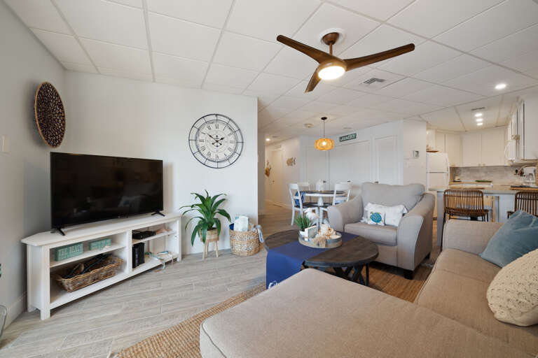 Open concept living area leading to the Dining Table and Kitchen