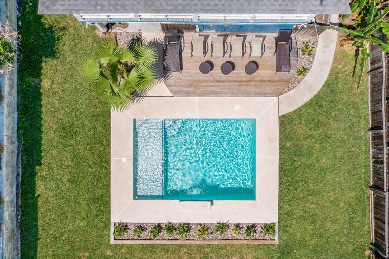 Aerial view of 103 E. Tarpon's private heated pool and backyard.
