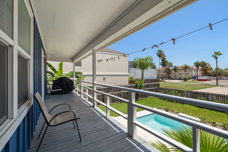 South facing balcony with BBQ pit overlooks the private heated pool!