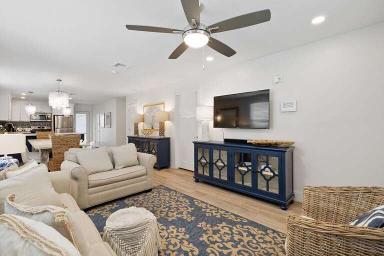Living room provides you with a large flat screen TV and comfortable seating.
