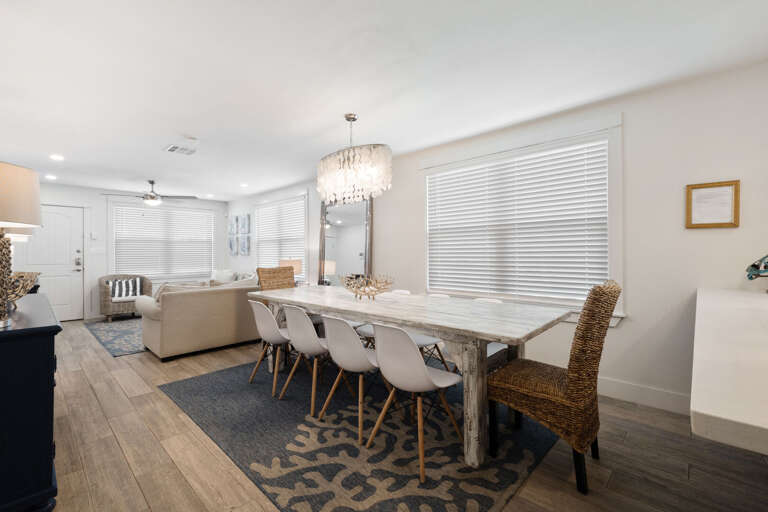Open concept dining area just between the living room and kitchen. Ample seating for all guests!