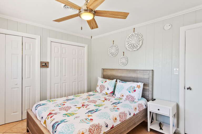 1st guest bedroom (2nd floor) is equipped with a Queen size bed and flat screen TV.