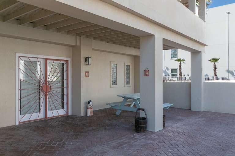 Front patio and entrance with shaded seating!