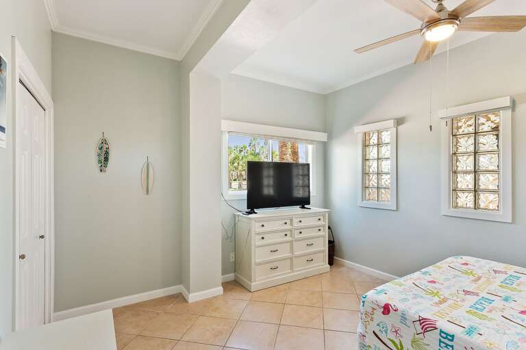 Guest bedroom entails a Queen size bed and flat screen TV! (Ground Floor)