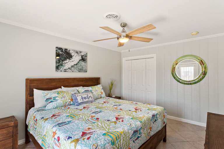 Your master bedroom (2nd floor) features a King size bed and flat screen TV. You'll also have direct access to the balcony.