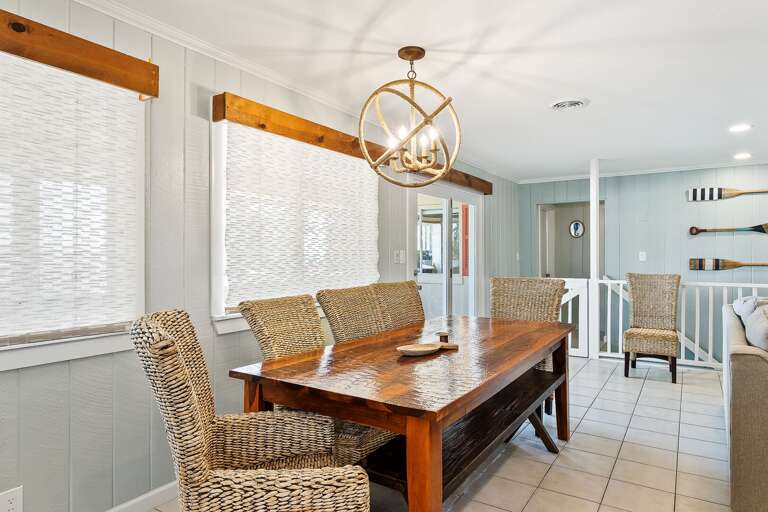 Newly furnished dining table accommodates 8 guests