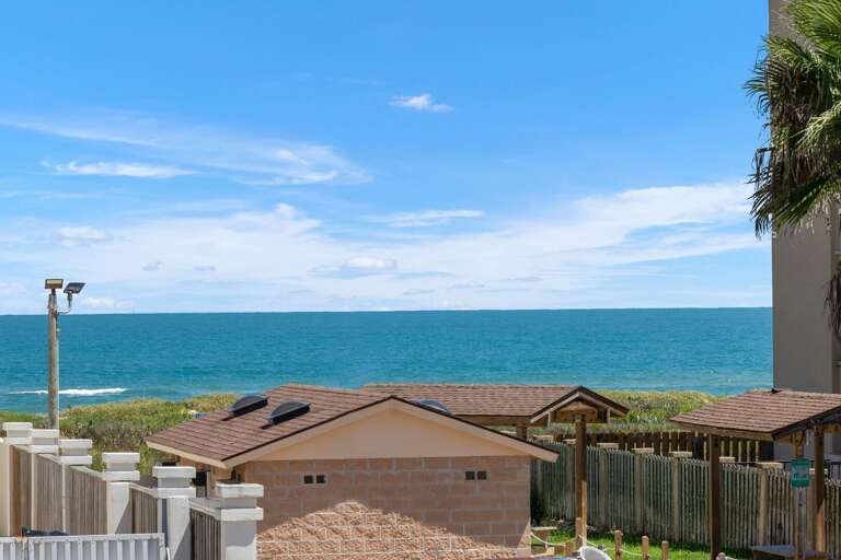 Views from 2nd floor patio to the beach!