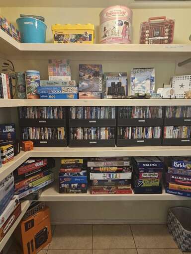 Game closet located in guest bedroom! Tons of DVD's, board games, and more!