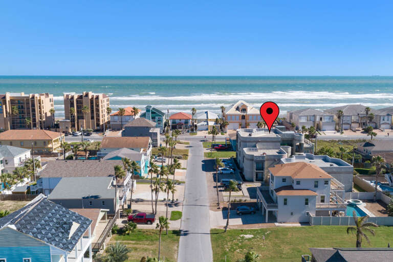 Aerial view of the property just steps away from the beach!