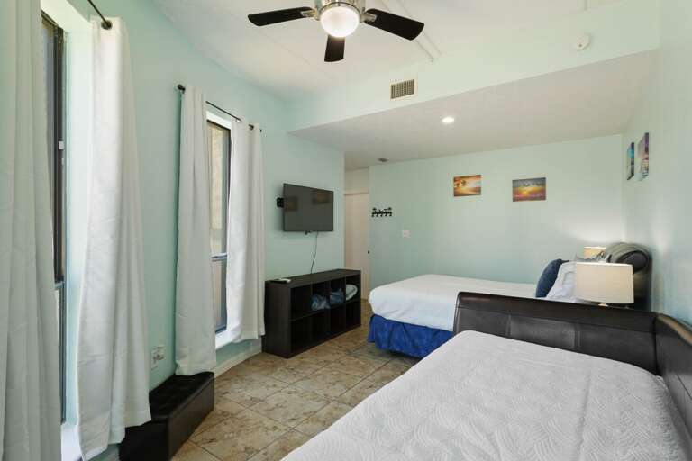 Master Bedroom features a Flat Screen TV Master Bedroom features a Flat Screen TV