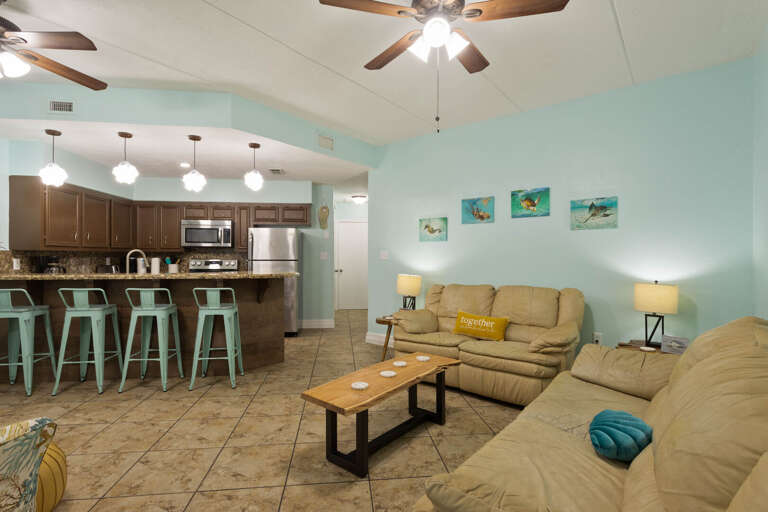 Spacious living area leading to the kitchen is perfect for dinner and movie nights! Spacious living area leading to the kitchen is perfect for dinner and movie nights!