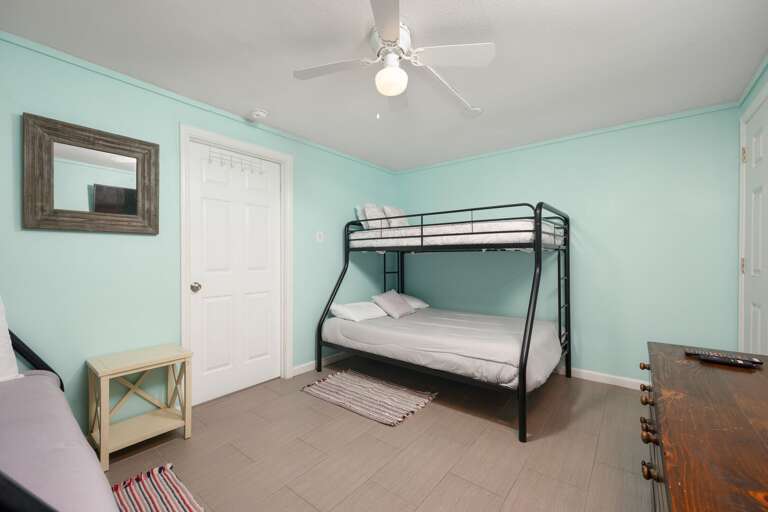 1st Floor Guest Bedroom features 2 sets of Twin over Full Bunk Beds