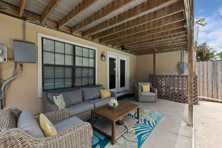 Backyard seating to enjoy the island climate poolside!