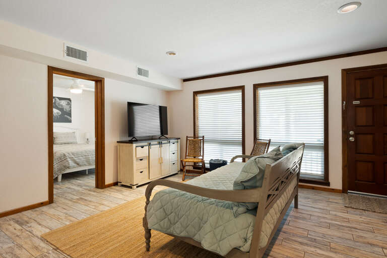 Ground floor living room with Twin day bed and flat screen TV