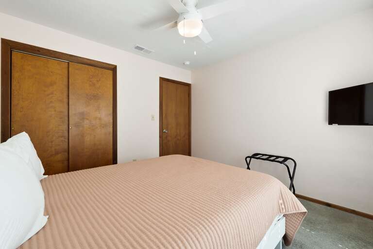 Guest bedroom with Queen bed and flat screen TV (room #4, 2nd floor)