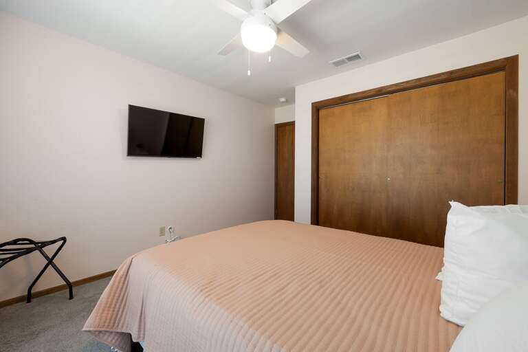 Guest bedroom with Queen size bed and flat screen TV (room #2, 2nd floor)