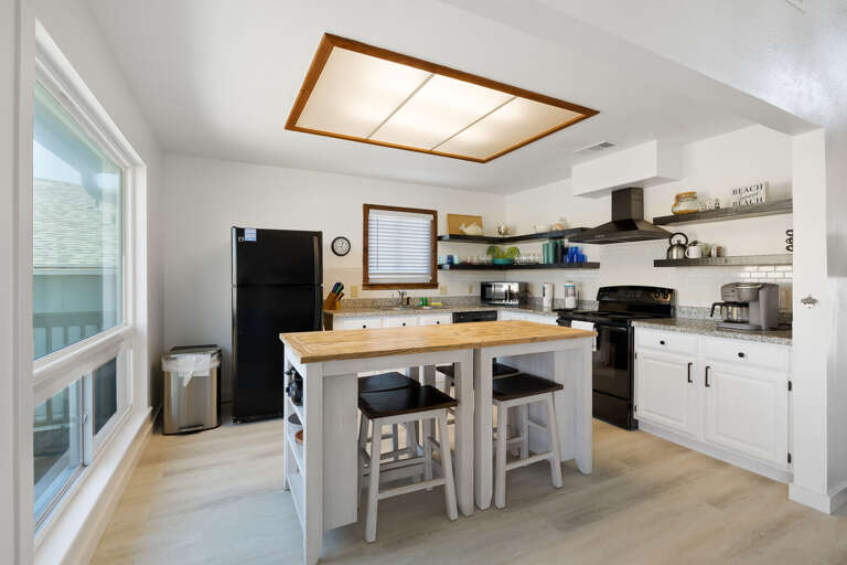 Kitchen is fully stocked with pots, pans, dishware, etc. for your home cooked meals!